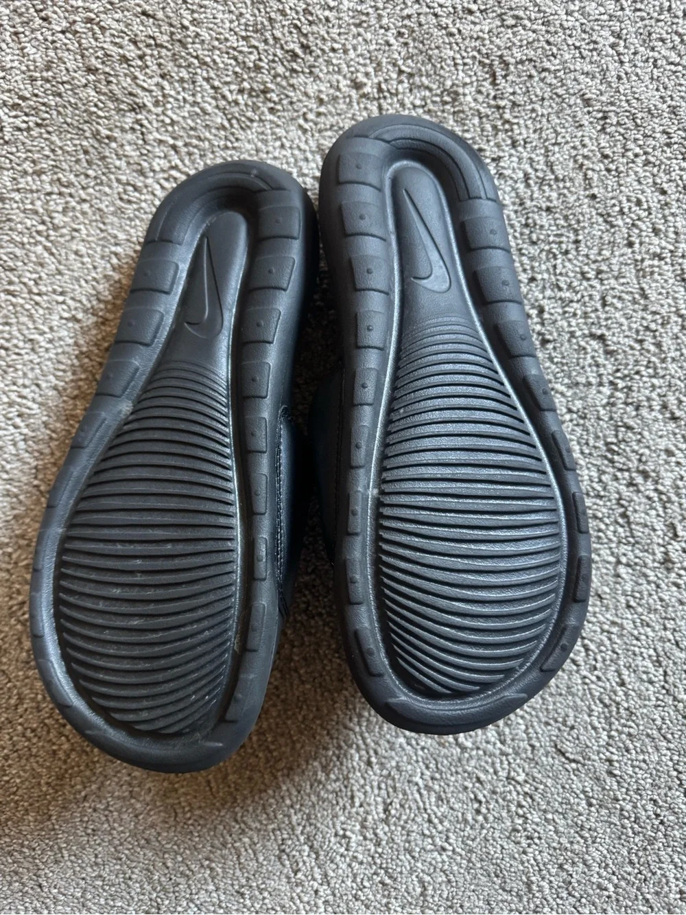Nike Black Slides with Metallic Bronze Logo